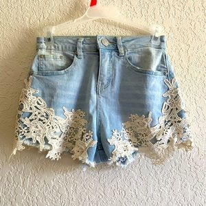 Almost famous high rise light wash denim shorts.